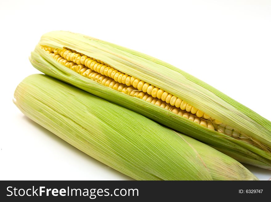 Two corns isolated on white background