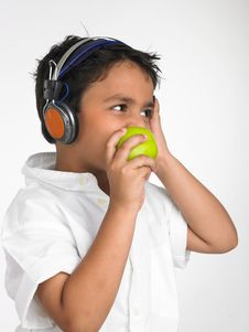 Boy Biting Into A Green Apple Stock Photography Boy Biting Into A Green Apple Stock Photography