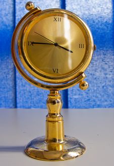 Golden Table Clock Stock Image