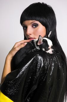 The Girl With A Small Dog Royalty Free Stock Photos