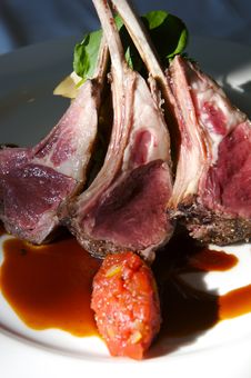 Gourmet Lamb Chops With Garnishes Stock Photo