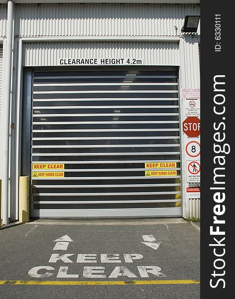 Keep Clear sign out front of roller door