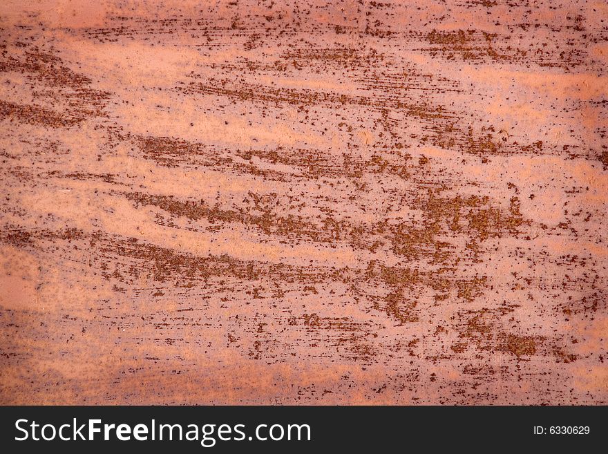 A photo of a grunge background with rust