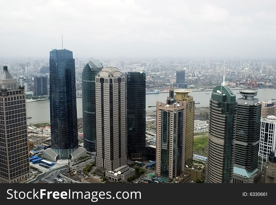 China, Shanghai city - general cityscape, aerial view from the highest building. China, Shanghai city - general cityscape, aerial view from the highest building.