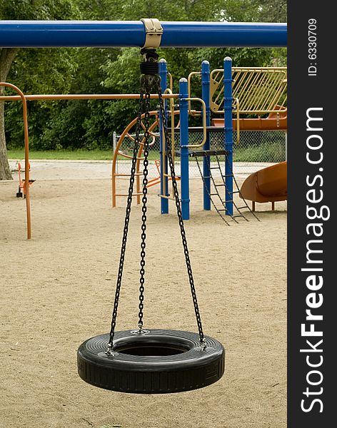 Black tie swing at a playground. Black tie swing at a playground