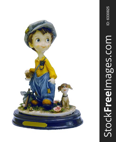 A figurine of a boy in outdoor. A figurine of a boy in outdoor.