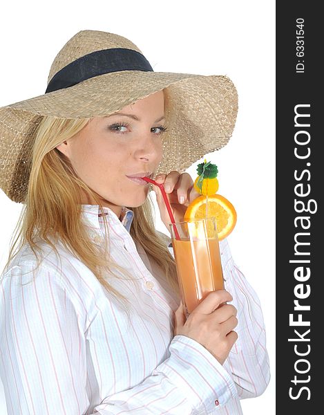 Young woman enjoying a long drink with straw.Wearing a straw hat. Young woman enjoying a long drink with straw.Wearing a straw hat.