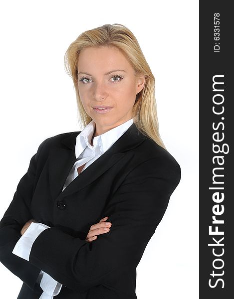 Selfconfident business woman posing, wearing a black jacket.