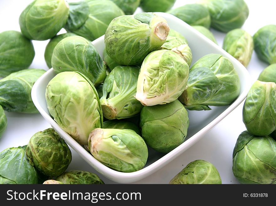 Some fresh raw brussels in a bowl