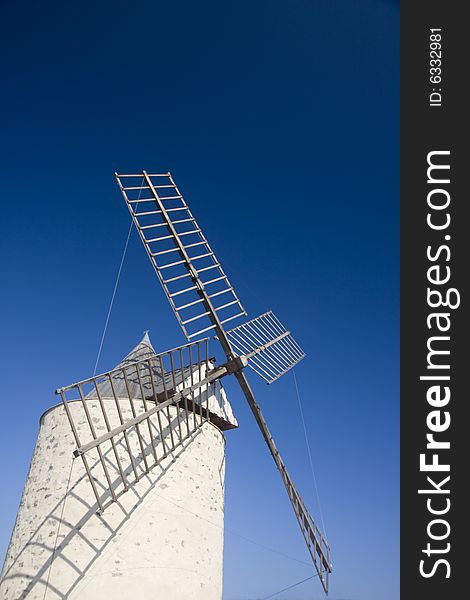 An old windmill on a sunny day in southern france