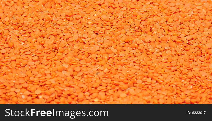 A background shot of some red lentils