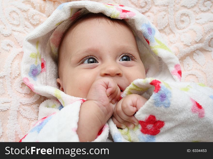 Little baby in dressing-gown before bath. Little baby in dressing-gown before bath.