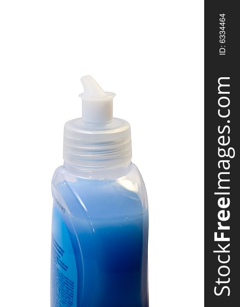 Detergent in blue plastic bottle on white