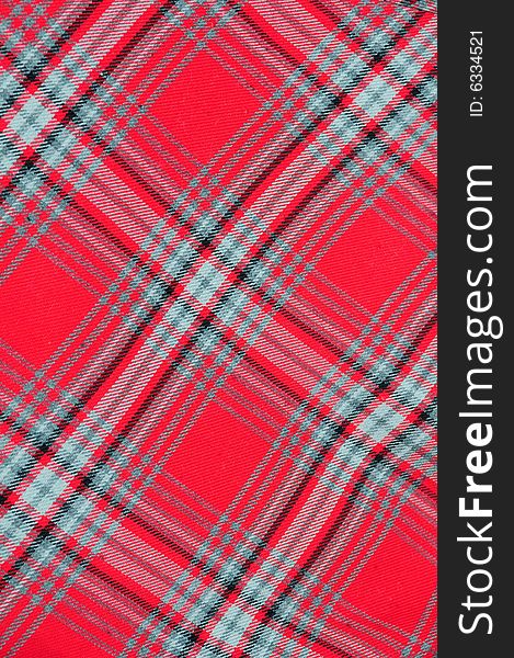 Background of a red checkedtweed material. Background of a red checkedtweed material