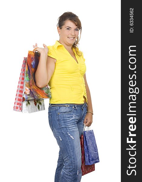 Happy girl holding shopping bags, isolated, on white background