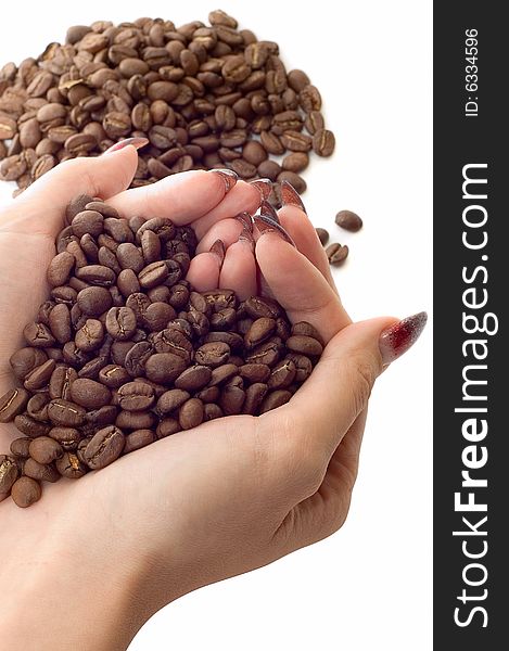 Female Hands And Coffee Beans