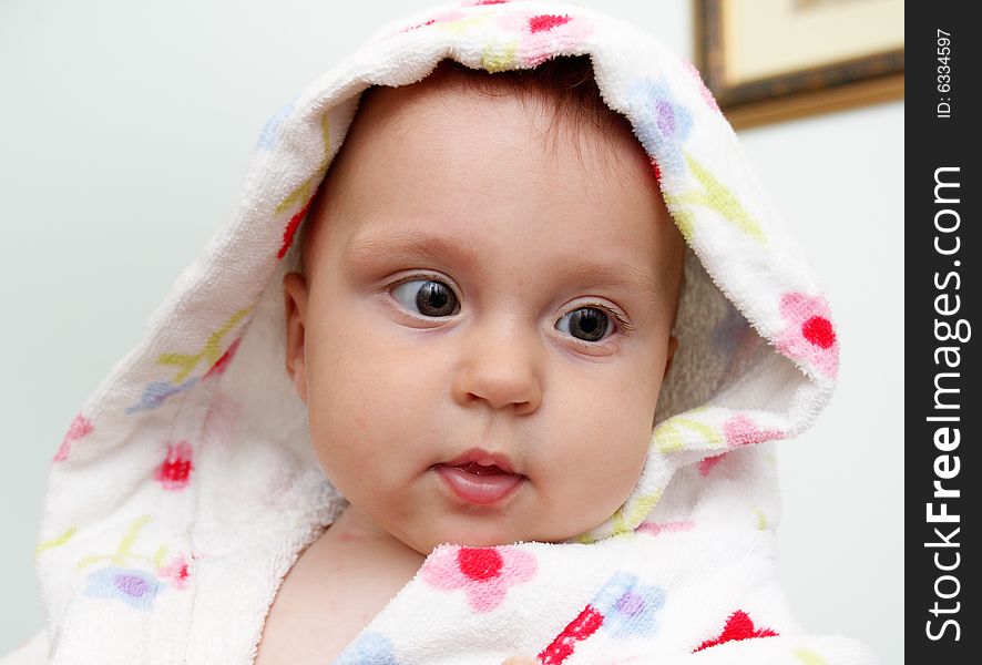 Little baby in dressing-gown before bath. Little baby in dressing-gown before bath.