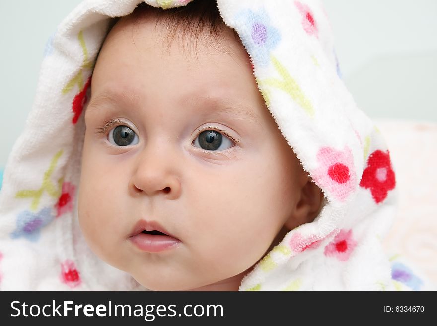 Little baby in dressing-gown before bath. Little baby in dressing-gown before bath.