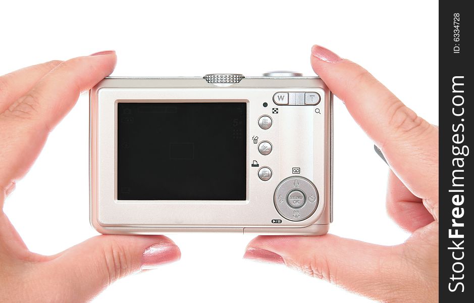 Small silver digital photo camera. Small silver digital photo camera
