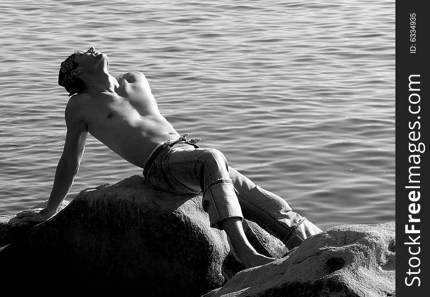 Handsome Man At The Rocky Beach