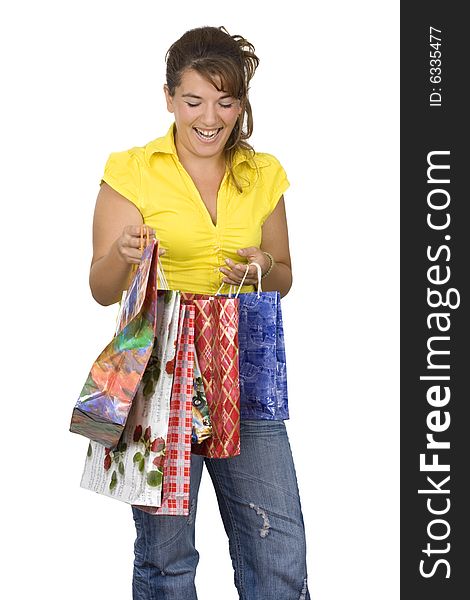 Happy girl holding shopping bags, isolated, on white background