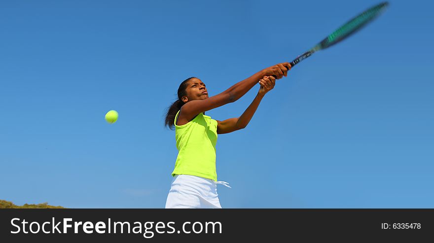 Teenage female tennis player