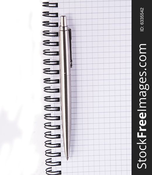 Pen and notebook, isolated on white background. Pen and notebook, isolated on white background.