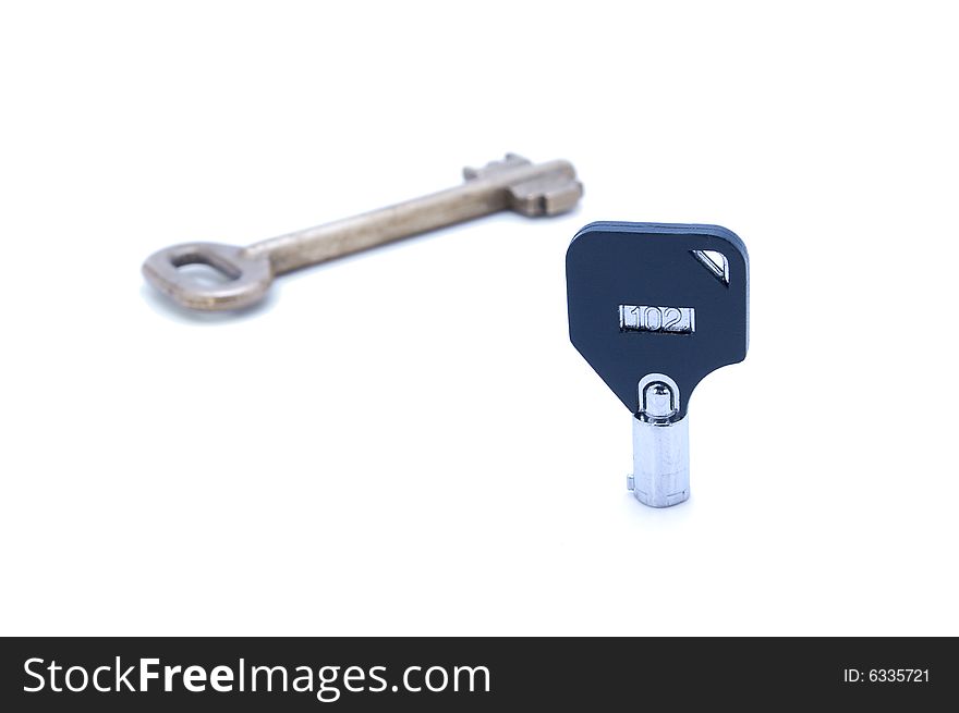Small modern and large old key. Small modern and large old key