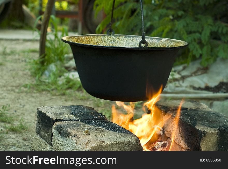 Soup preparation in a saucepan on fire. Soup preparation in a saucepan on fire