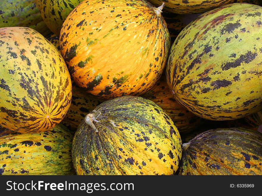 Healthy organic melons as background