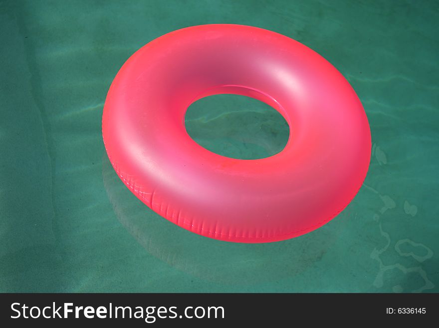 Flotation ring in swimming pool