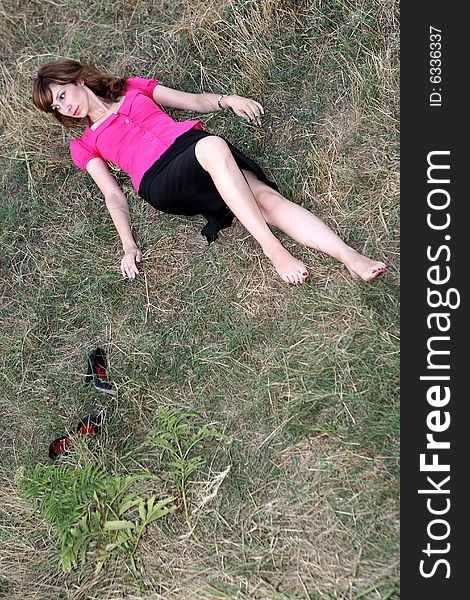 A nice girl lying in the field. A nice girl lying in the field