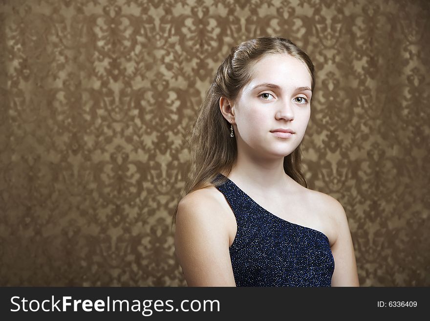 Confident Young Girl in a Party Dress