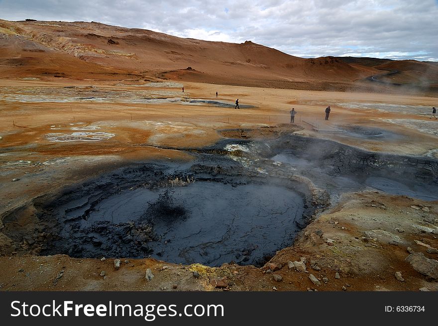 Extinct volcanic cones of yellow colour in the north of Iceland. Extinct volcanic cones of yellow colour in the north of Iceland