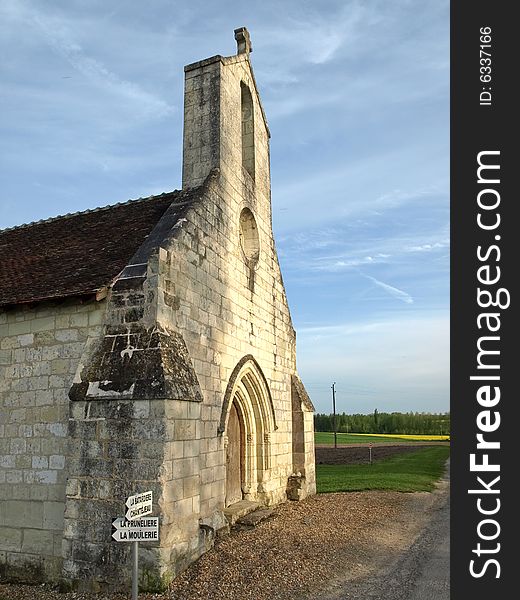Medieval chapel in the middle of fields in France. Medieval chapel in the middle of fields in France