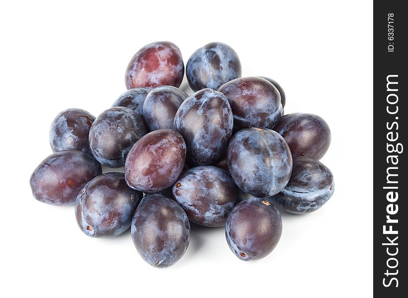 Fresh appetizing plums on a white background. Fresh appetizing plums on a white background