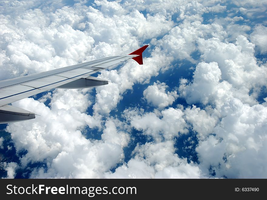 View at high altitude, with sky and clouds. View at high altitude, with sky and clouds