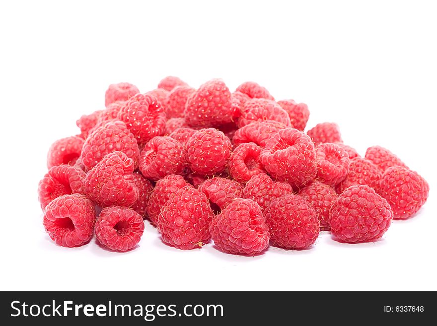 Healthy pink raspberry over white