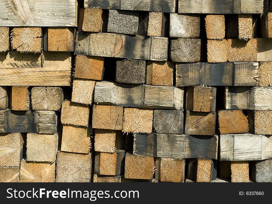 A texture of a stack of wood. A texture of a stack of wood
