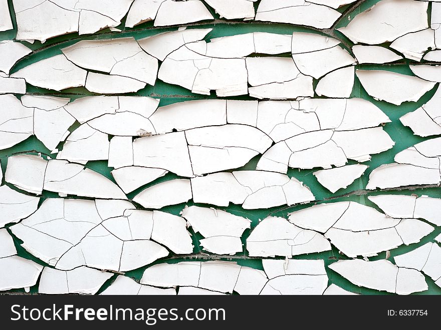 Painted cracked glass with green background