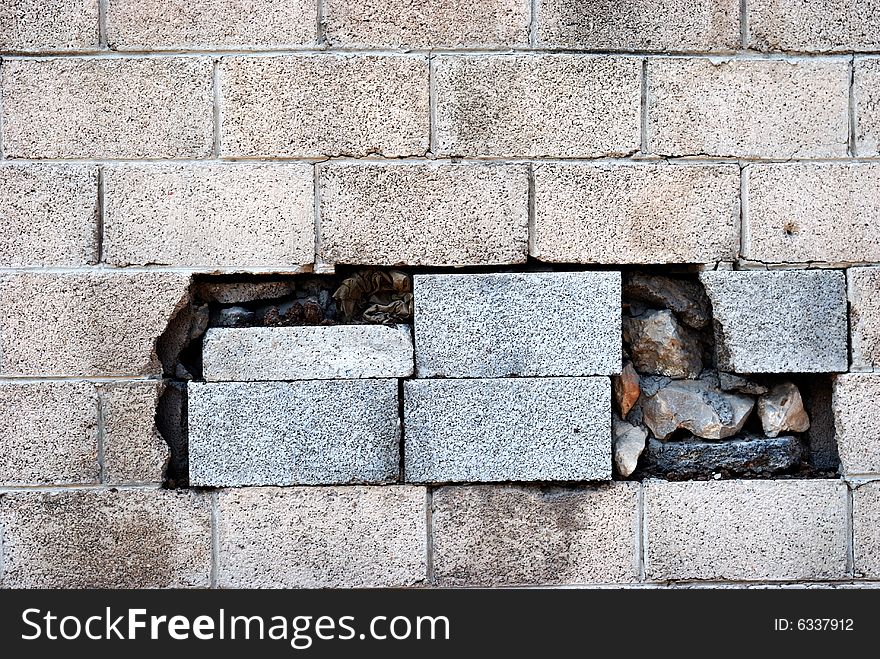 Wall and hole reaired by concrete blocks