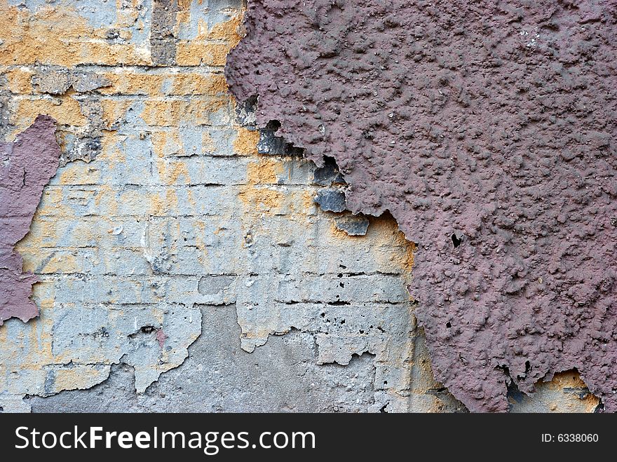 Old brick wall with prints of bricks