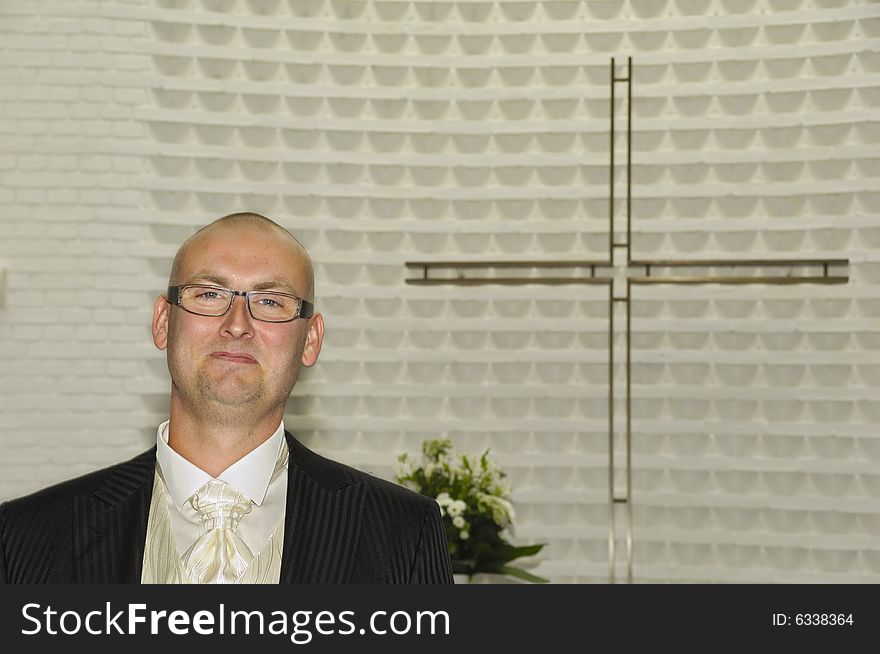 Groom In Church Waiting