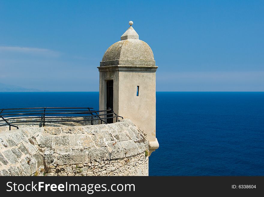 Beautiful tower above blue sea