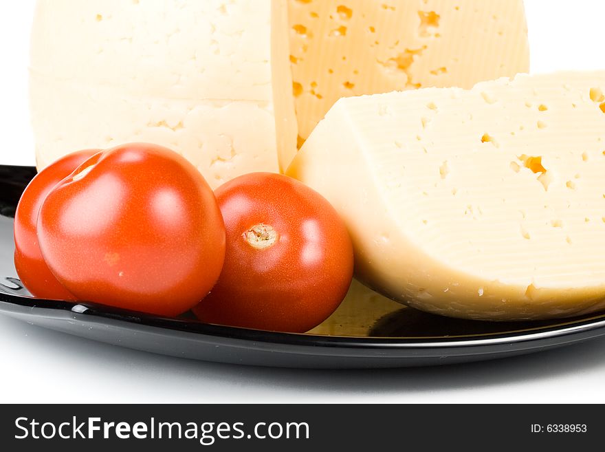 Fresh appetizing cheese on a white background. Fresh appetizing cheese on a white background