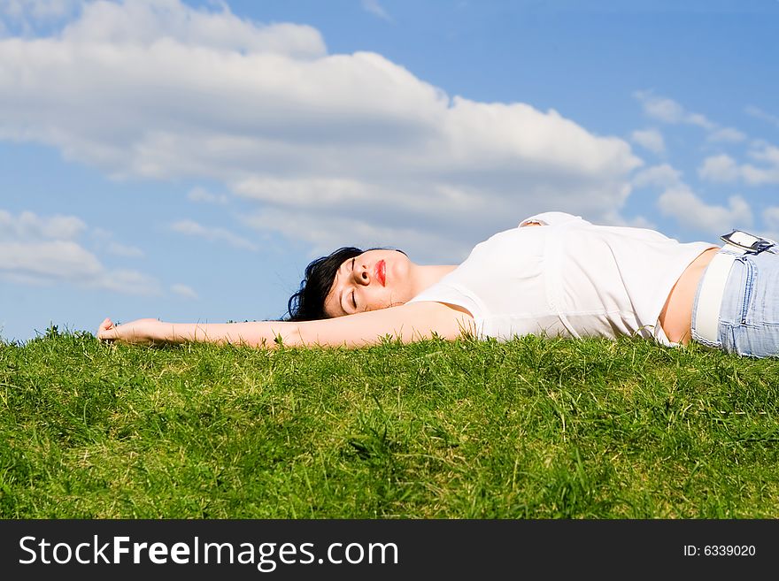 Sweet woman rest on the grass