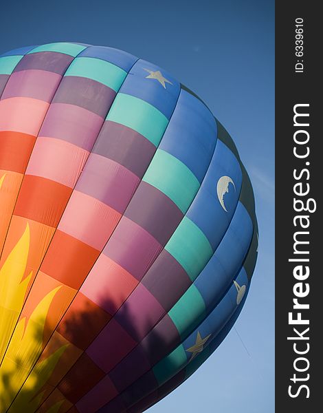 Colorful hot air balloon on a blue sky