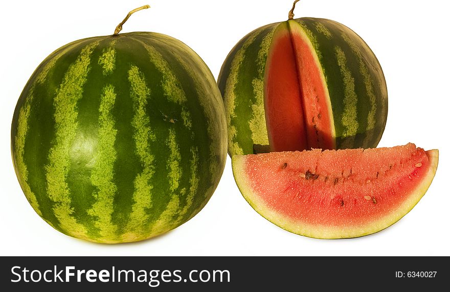 Two fresh watermelons on the white background