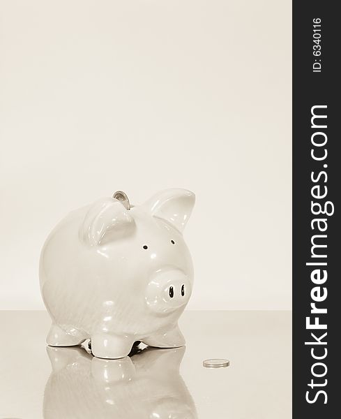 My two cents on planning for the future; spend a little, save a little. A photo of my Piggy bank.