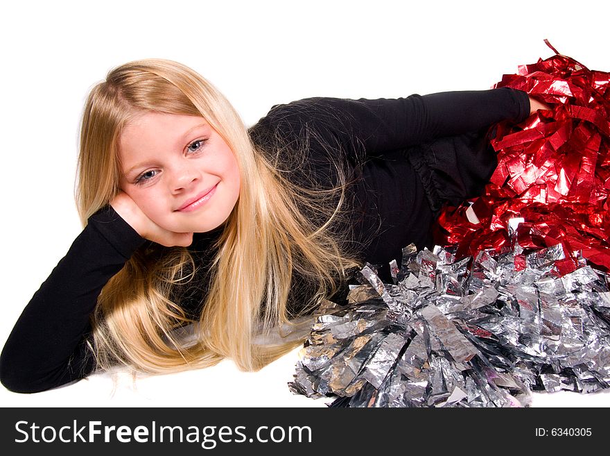 Cheerleader resting on elbow laying down with pom-pom